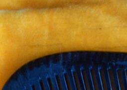 黑牛角梳的功效与作用（黑白牛角梳功效区别）