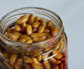 醋泡黄豆的做法与功效（醋泡黄豆的做法与功效禁忌）