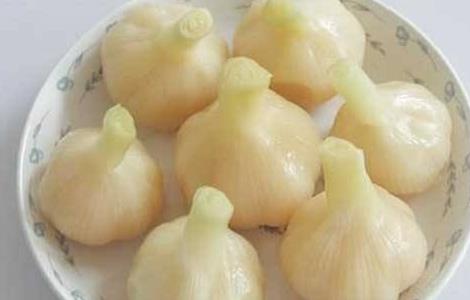 糖醋蒜的功效与作用（糖醋蒜的功效与作用害处）