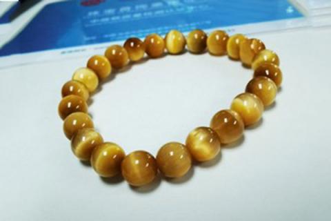 金虎眼石的功效与作用（天然金虎眼石的功效与作用）